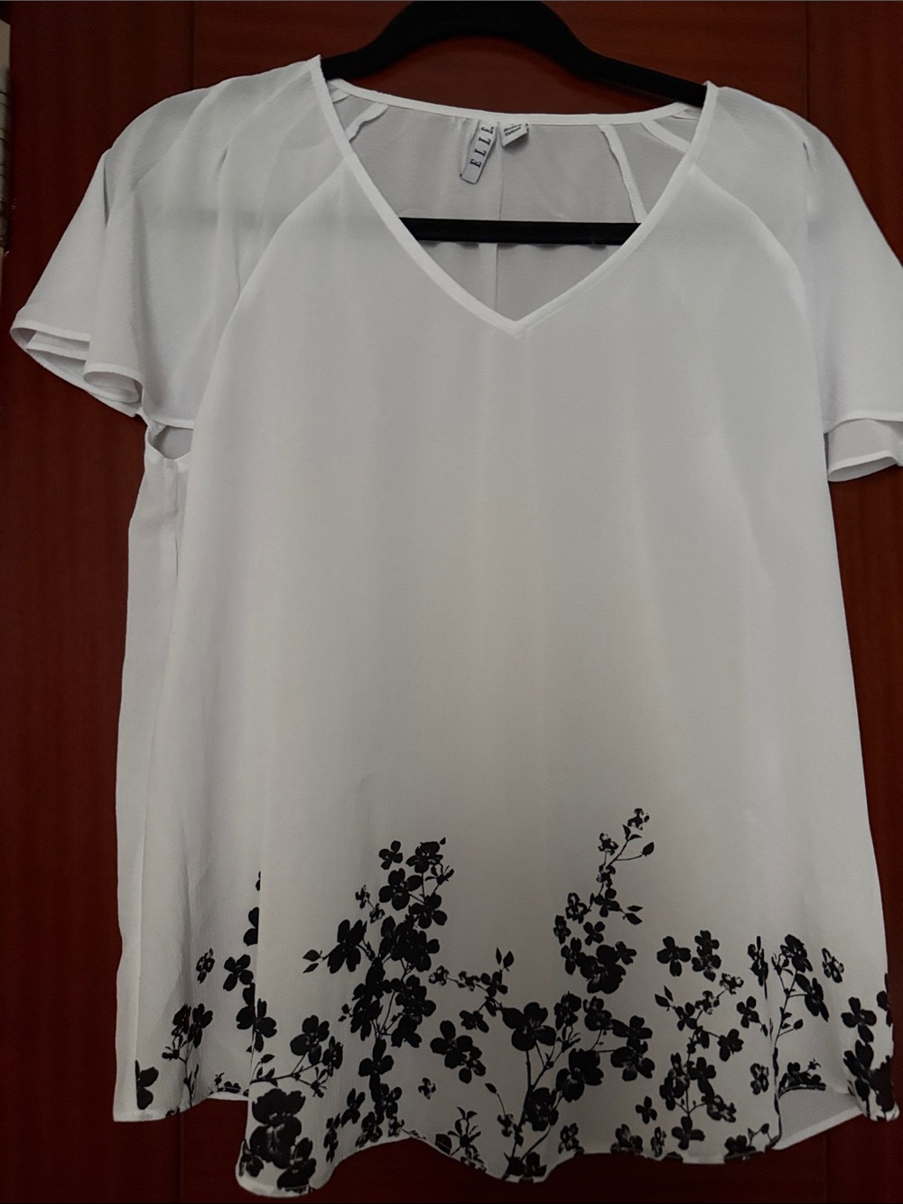 Elle White V-Neck Flutter Sleeve Top with Black Floral Border